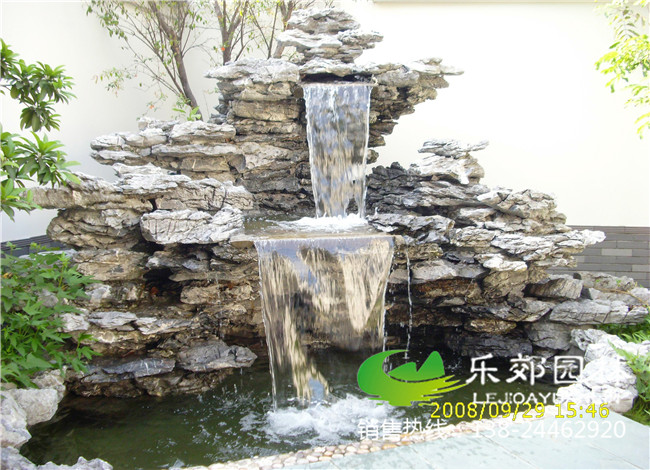 英石堆的魚(yú)池假山流水設計圖1