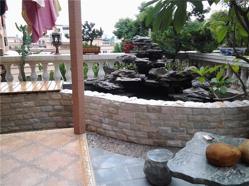 廣州番禺區洋房陽(yáng)臺魚(yú)池假山設計與制作圖片4